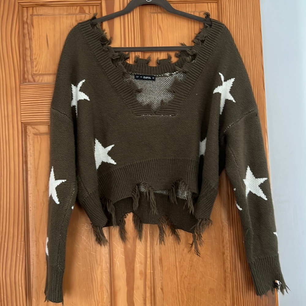 Size medium, off-the-shoulder, cropped sweater.